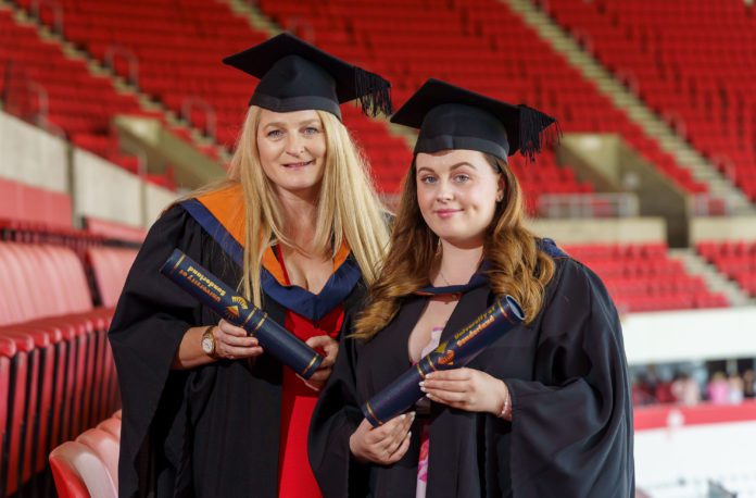 Veronica Allton, collects her BA Education Studies degree, just a day before daughter Holly Allton, 27, picks up her BA Journalism degree, during the University’s graduation ceremonies at the Stadum of Light.